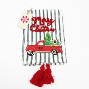$7.00 min 12 - RED TRUCK MERRY CHRISTMAS ON GREEN TICKING TEA TOWEL