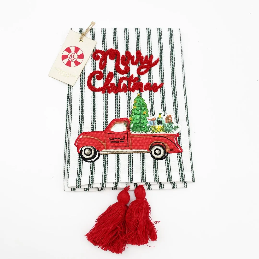 $7.00 min 12 - RED TRUCK MERRY CHRISTMAS ON GREEN TICKING TEA TOWEL