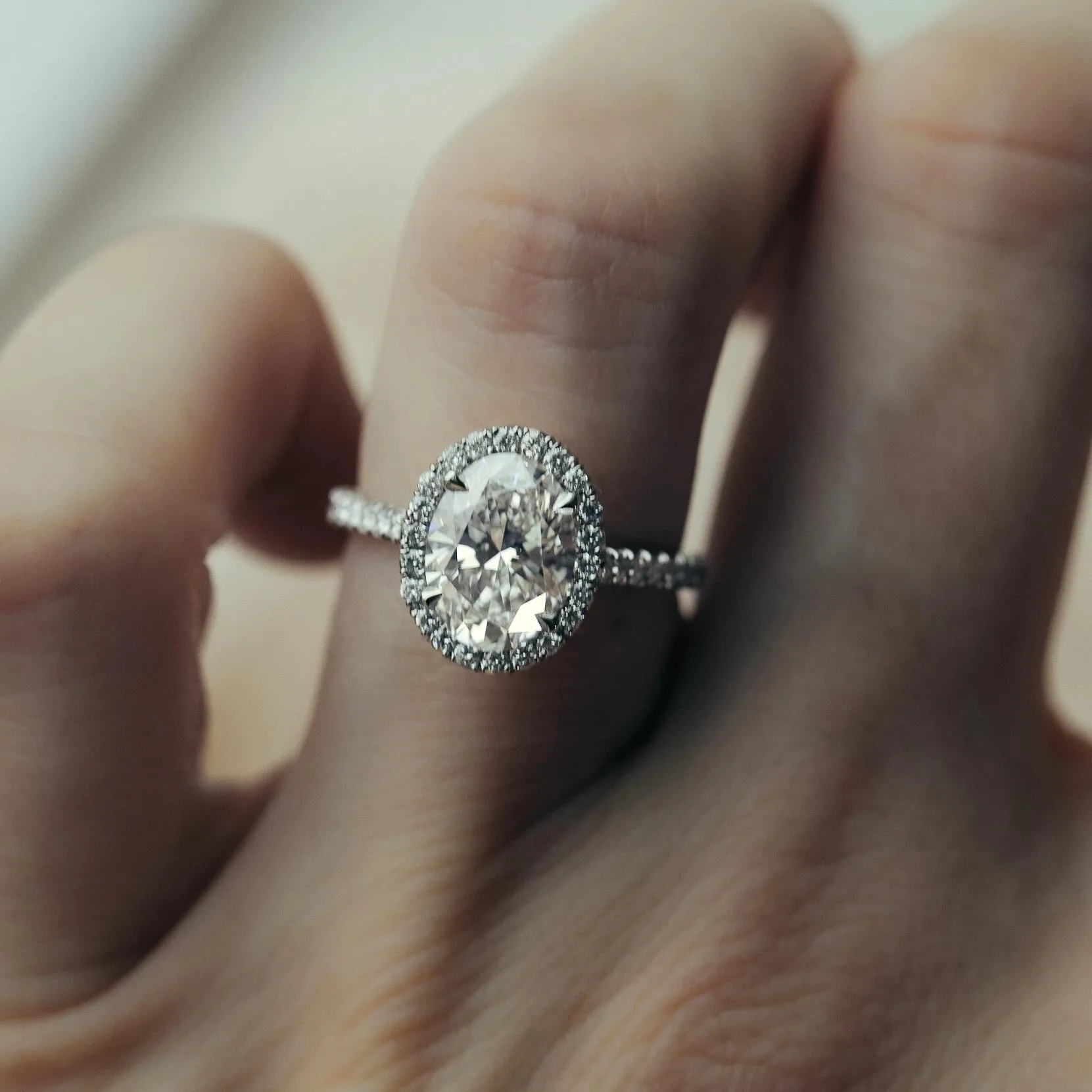 Aurora Pavé Halo Ring With Oval Cut