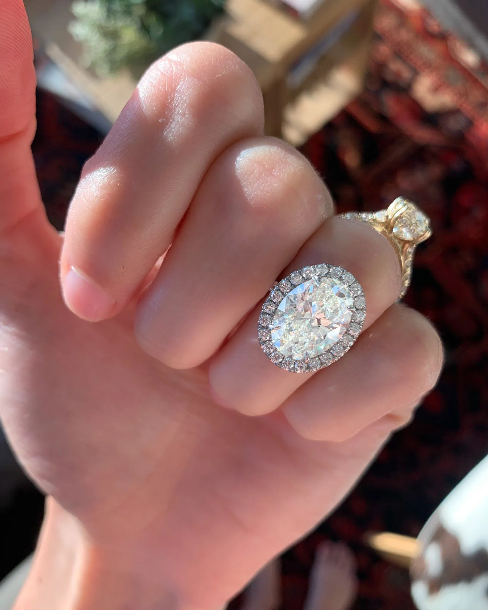 Aurora Pavé Halo Ring With Oval Cut