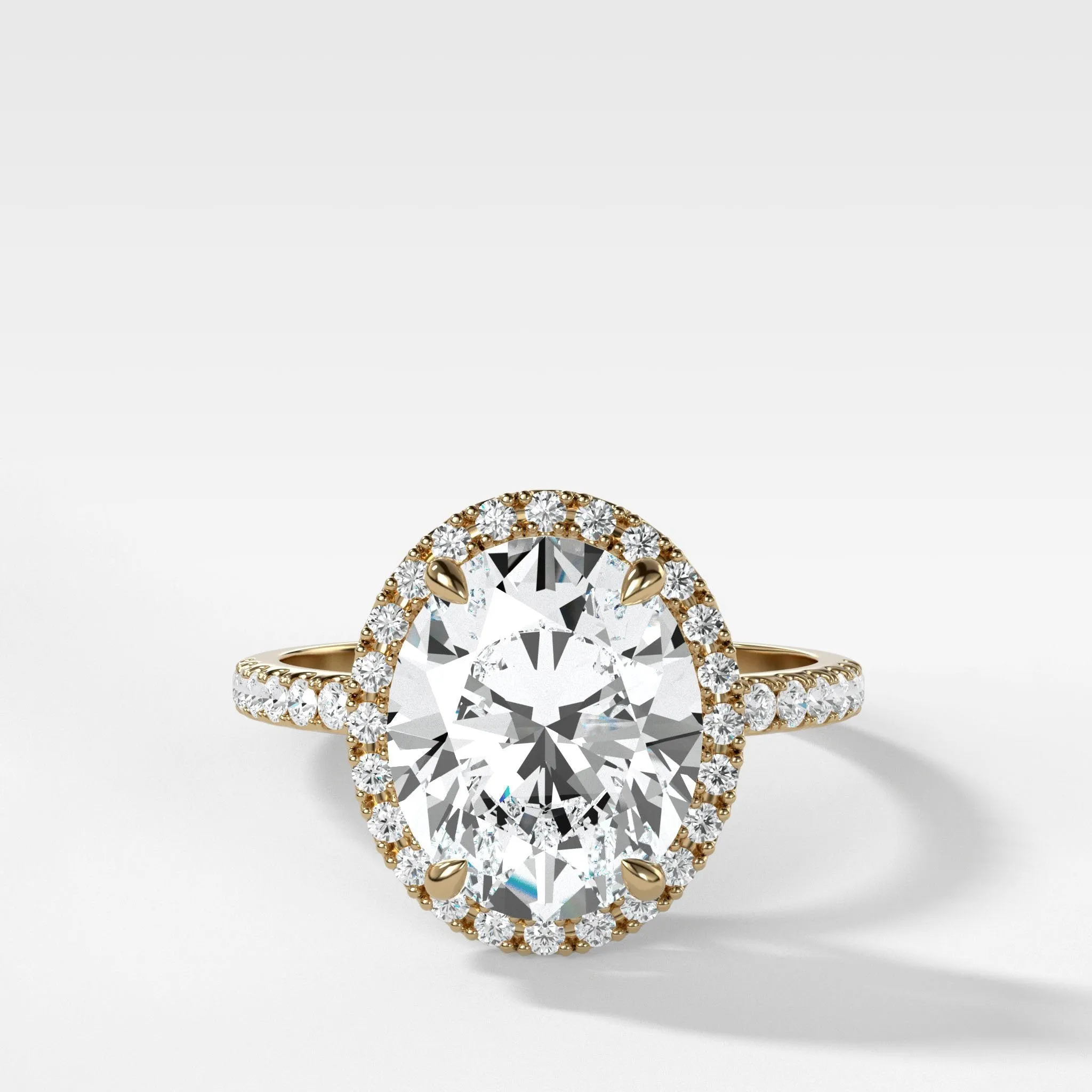 Aurora Pavé Halo Ring With Oval Cut