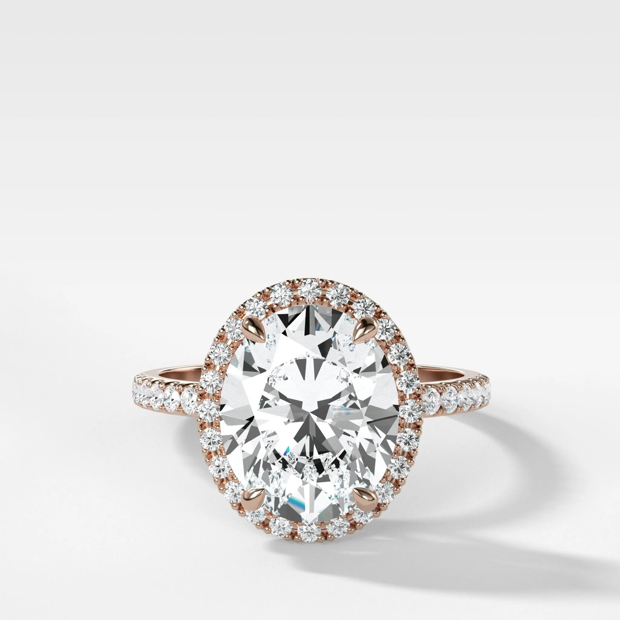 Aurora Pavé Halo Ring With Oval Cut
