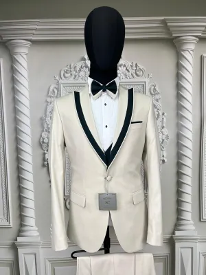 Single Button Three Piece Tuxedo Suit with Black velvet accented Lapel and Pants.