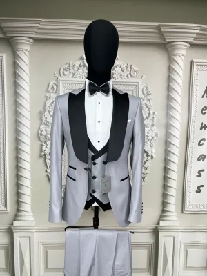 Single Button Three Pieces Tuxedo Suit with contrasting green velvet Lapel, matching bow tie and Black Pants.