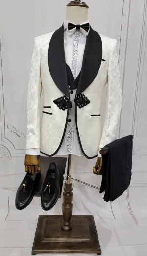Three Piece Tuxedo Suit with Contrasting Black Lapel, matching bow tie and Black Pants. white knot